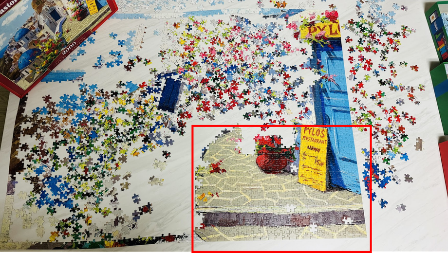 A picture of a jigsaw puzzle gathered by similar colors