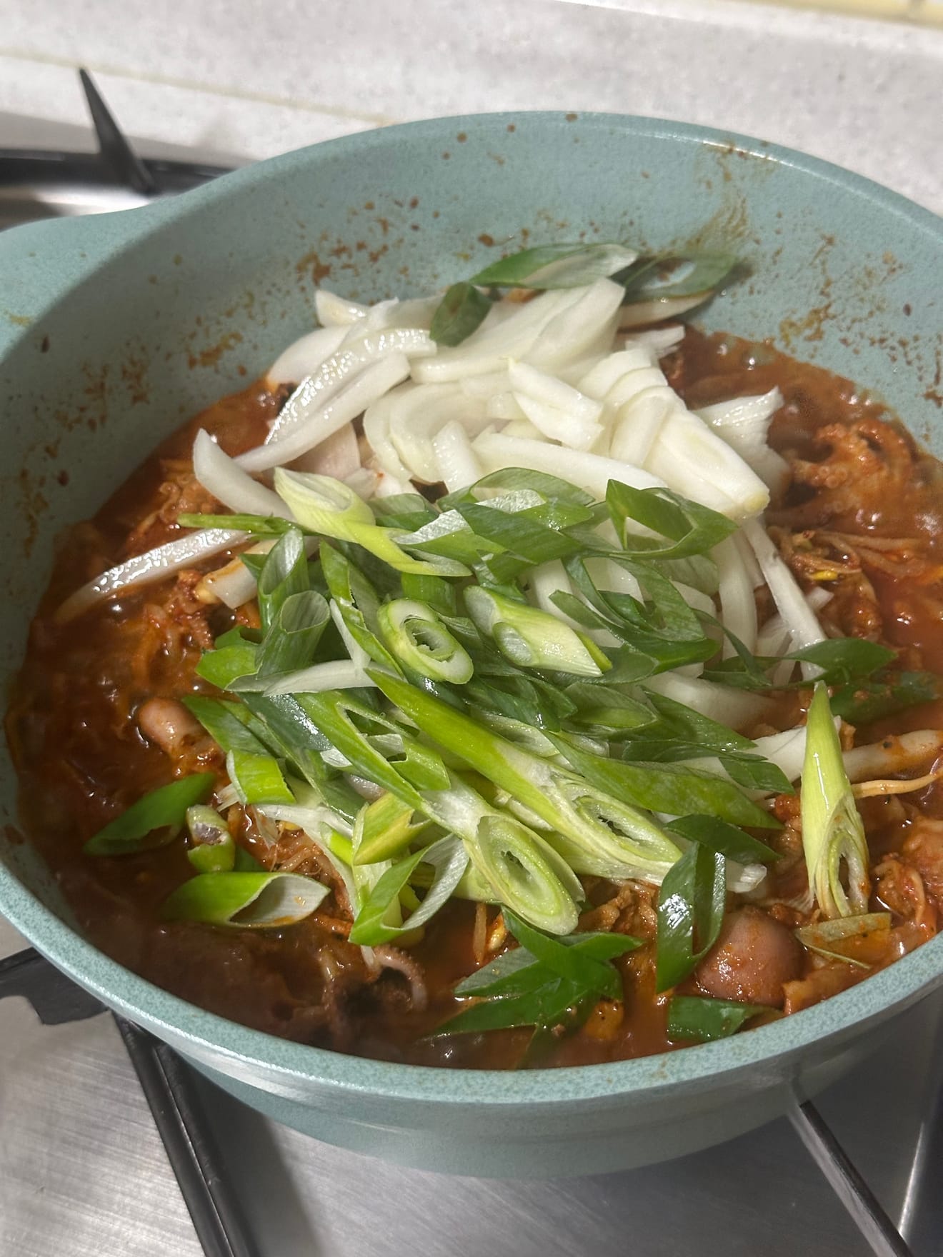 Salteado de pulpo y panceta (쭈꾸미삼겹살볶음) 쭈삼