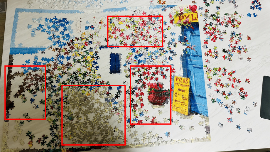 A picture of a jigsaw puzzle gathered by similar colors