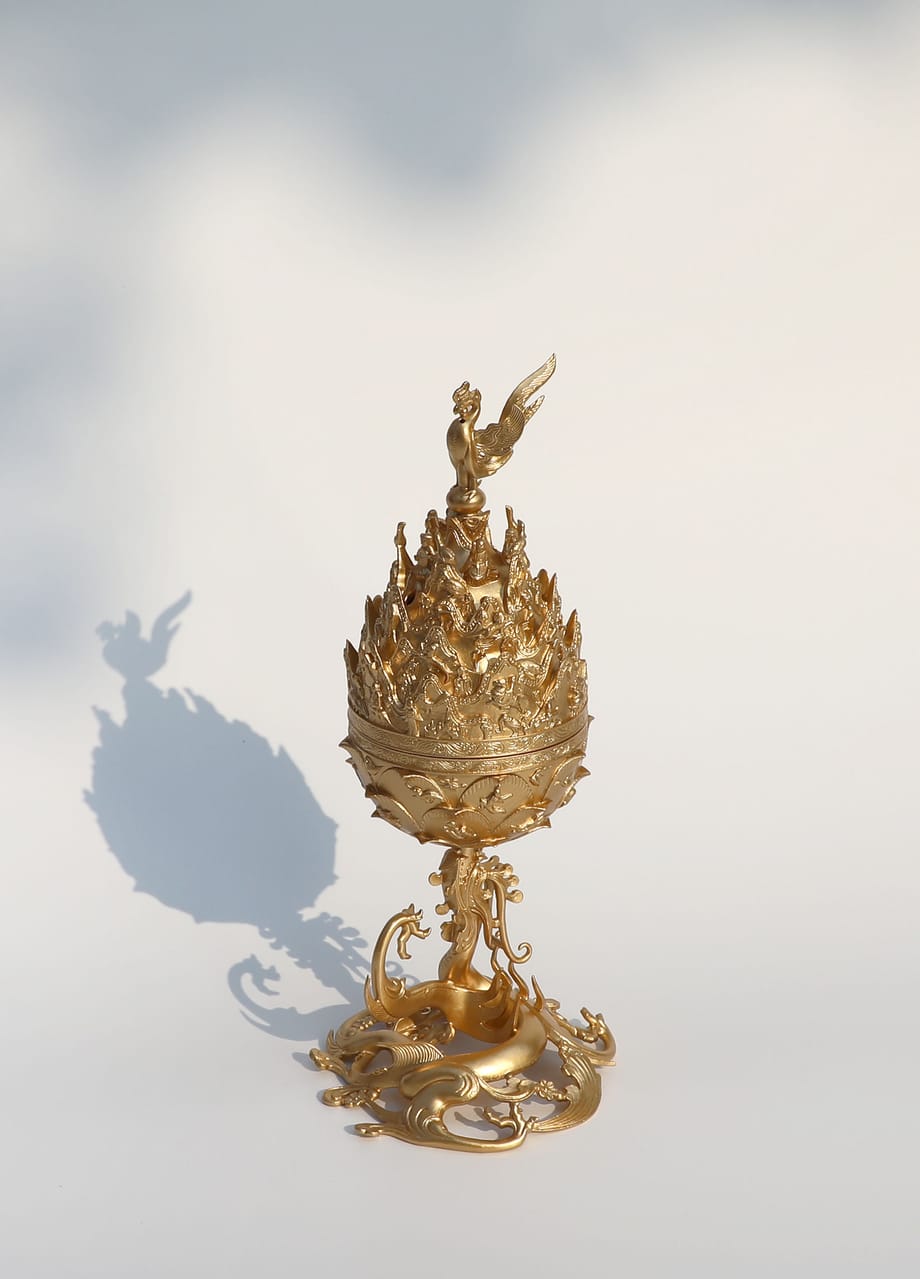 Miniaturmodell des Goldenen Weihrauchbrenners Foto