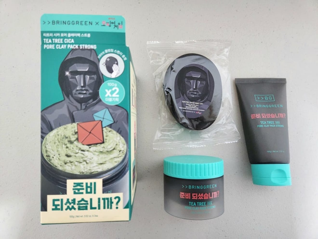 ของที่ระลึกจากการร่วมมือกันระหว่างเกมイカゲーム (Squid Game) และแบรนด์ Bring Green ที่ Olive Young